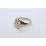 9ct gold gent's signet ring with oval panel, inscribed initials LR, size Z, 7.4g approx