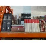 A shelf of mostly hardback books incl. Who's Who, Dickens etc