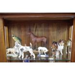 A Royal Doulton 'Lassie' dog figure HN1057, A Beswick figure of racehorse 'Arkle' a Karl Enns Parrot