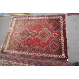 A Hamadan rug with diamond medallions, 162 x 120 cms