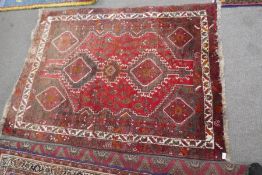 A Hamadan rug with diamond medallions, 162 x 120 cms