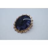 9ct gold mounted oval purple agate panel surrounded by fancy 9ct gold frame, marked 9ct