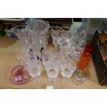 A selection of cut glass including decanters and some 'Whitefriars' style Studio glass