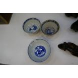 A 19th century Chinese tea bowl having four character mark, a Chinese blue and white bowl decorated