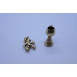 George Jensen; 2 9ct yellow gold charms, Pinnochio and a Goblet, both marked 2.9g approx