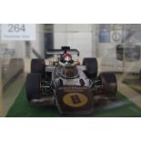 Tamiya; a 1;12 scale model of Lotus J.P.S Formula One car in perspex case