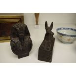 An Egyptian style figure of Anubis on oblong base with hieroglyphic decoration 10cms, and one other