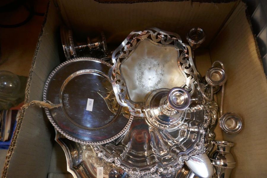 A box of various silver plate items