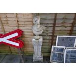 A reconstituted bust of Romanesque man, on a pedestal base