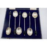 A set of six silver cased coffee spoons having coffee bean terminals. Hallmarked Birmingham Elkingto
