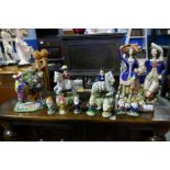 Reproduction Staffordshire figures and seven dwarf figures