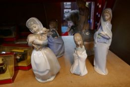 Five various Lladro and Nao figures