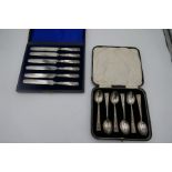 A cased set of six Barker Bromes silver ltd silver teaspoons, Birmingham 1928 and a cased set of sil