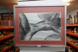 A framed and glazed charcoal sketch of a female nude, inscribed 'To David from Tony B 1977', by Anto