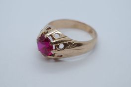 14ct yellow gold gent's ring with central claw mounted large synthetic Ruby, size Q, marked 585, app