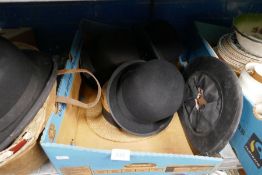 A selection of various vintage hats including bowlers, top, straw, etc