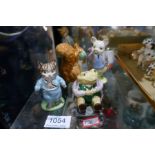 Five Beswick Potter figures and one other Royal Albert example