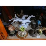 A set of mostly animal figurines, some being manufactured by Country Artists