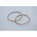 Pair of 9ct yellow gold hoop earrings, approx 2.5cm diameter, marked 9ct, 0.8g approx