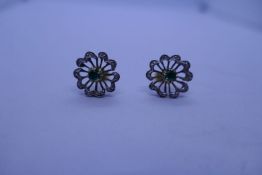 Pair of pretty 9ct emerald and diamond flower head design earrings, with butterfly backs, marks worn
