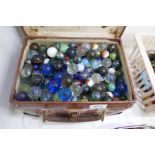 A small case of old marbles