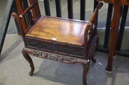 An old Chinese carved hardwood stool having box seat with pierced frieze, 63cm
