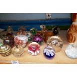 A quantity of paperweights