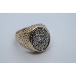 Gent's 18ct gold signet ring with encrusted oval diamond penal, marked 18ct, size S, 9.6g approx