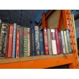 A shelf of various hardback books and folios on various subjects incl. Art