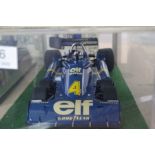 Tamiya; a 1:12 scale Tyrell P34 six wheeled Formula One car, in perspex case