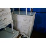 A quantity of white and gilt bedroom furniture, to include chest of drawers, pair of bedside tables,