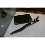 A silver decorated Victorian card case with crocodile leather outer and a lizard letter opener