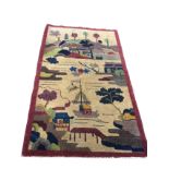 A 1930s woven wool rug of chinoiserie willow pattern type design on fawn ground framed by maroon