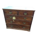 A nineteenth century mahogany chest of drawers, the panelled rectangular top above two short and