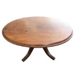 An oval nineteenth century mahogany breakfast table, the moulded top supported on a fluted