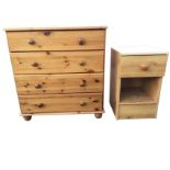 A contemporary pine chest of four long drawers mounted with knobs raised on bun feet; and a