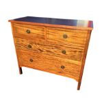 An Edwardian mahogany chest of drawers with later rectangular top, the two short and two long
