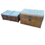 A scumbled tin trunk with studded domed moulded lid having carrying handles to ends; and a school