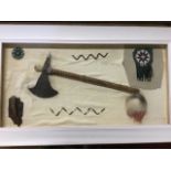 A case of North American Indian type pieces including beadwork, a tomahawk, porcupine quill