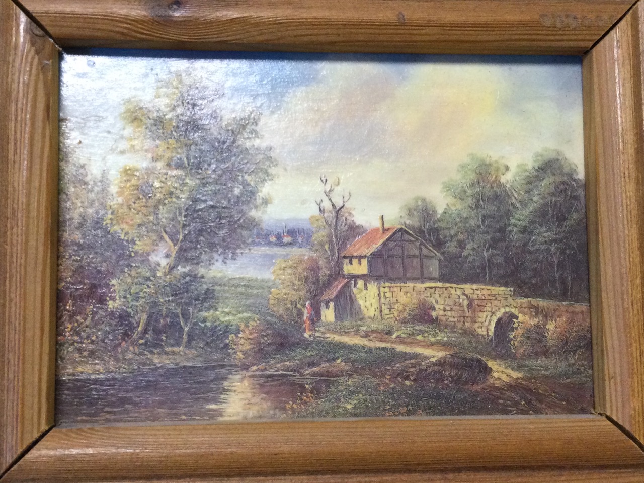 A pair of Victorian style landscape oleographs, one signed indistinctly, in wide moulded pine - Image 2 of 3