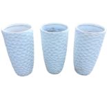 A set of three new tall circular white garden pots, moulded in relief with hexagonal honeycomb