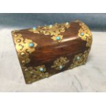 A Victorian walnut tea caddy with pierced celtic style brass mounts set with turquoise cabochon