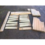 Pieces of a deconstructed pine pew, with plank seat, tongue & grooved back, tubular back rail,