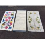 Two hand knotted floral wool rugs on cream ground; and a kelim type woven wool rug with grey