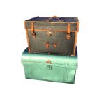 A Victorian travelling case with leather mounts; and a tin trunk with later paintwork, having