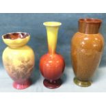 An ovoid brown glazed Linthorpe terracotta vase with tubular rim; a Linthorpe vase with