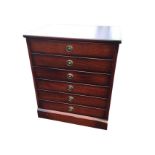 A reproduction mahogany dwarf chest of three drawers, modelled as six drawers mounted with brass