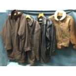 A Game brown waxed cotton coat; two leather jackets - brown & black; and a leather bomber type