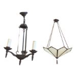 An octagonal hanging copper light fitting with tapering glass panels to umbrella shaped frame,