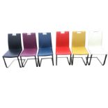 A set of six contemporary multicoloured cantilevered dining chairs, the backs & seats with